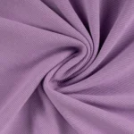 Lillakas soonikkoes kangas keeratud spiraaliks