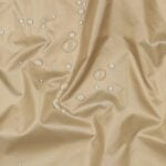 Veepiisad beežil veekindlal kangal