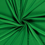 Roheline kangas keeratud spiraalseks mustriks