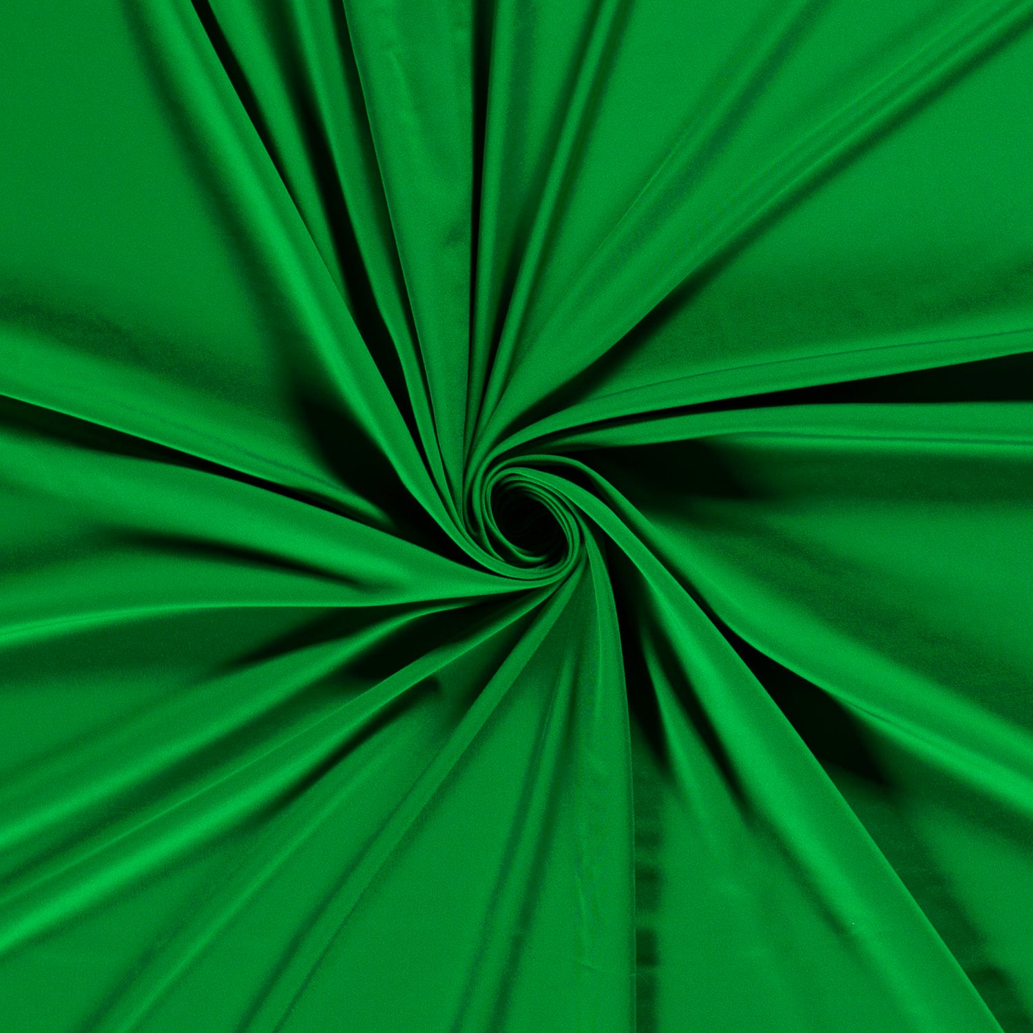 Roheline kangas keeratud spiraalseks mustriks