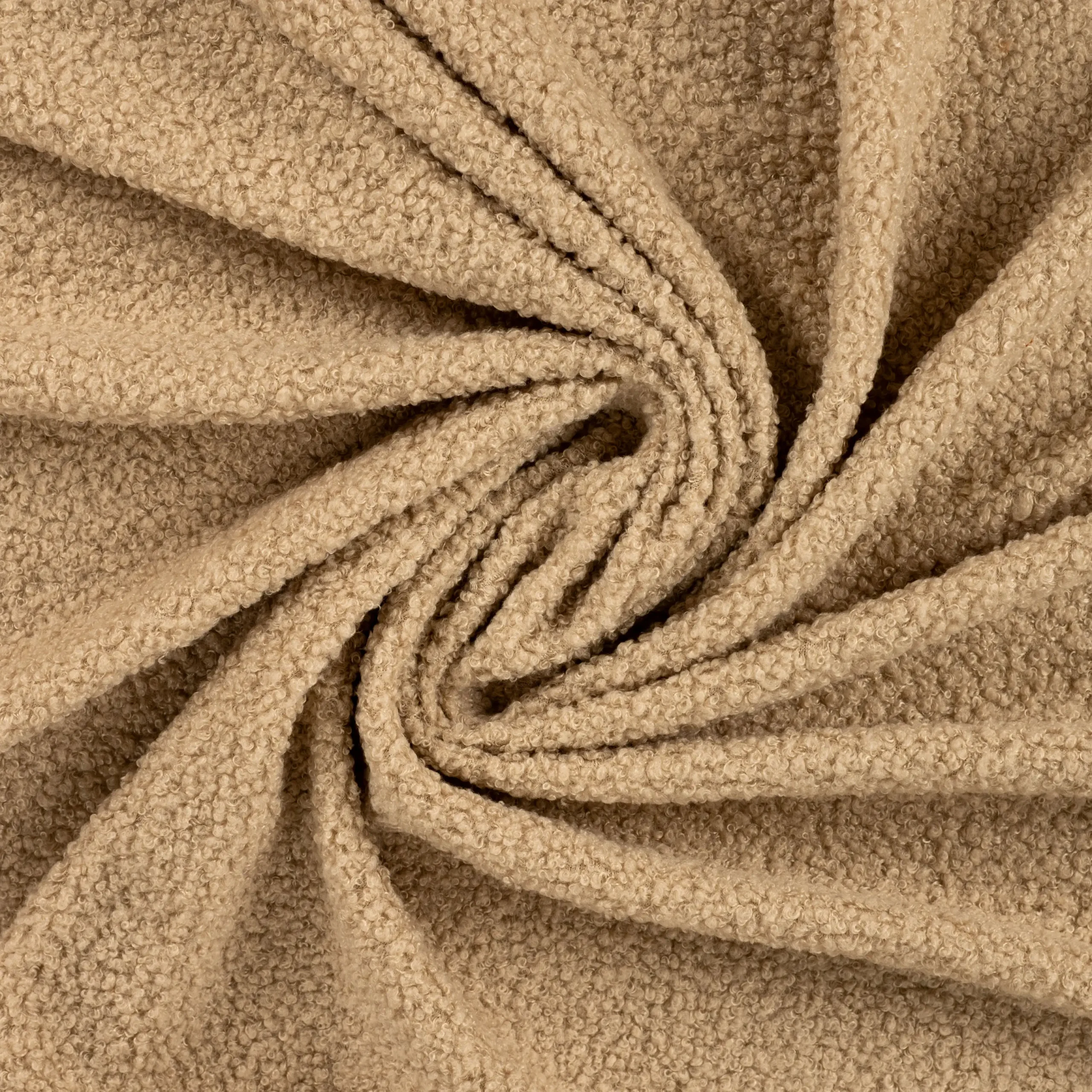 Beež tekstuurne buklee kangas lähivaates