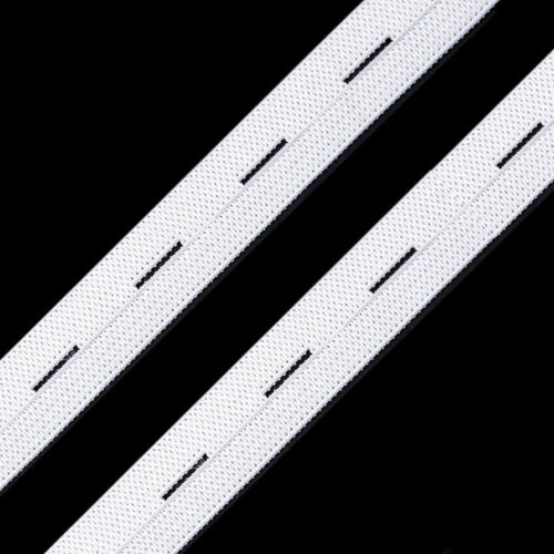 Valged elastsed paelad mustal taustal